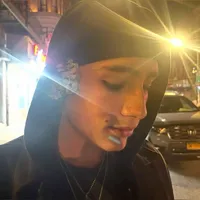 trench coat buttoned to the TOP